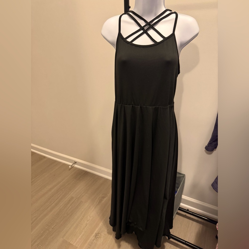 Women’s black handkerchief dress. NWOT. Size 1XL. Criss cross pattern on chest.